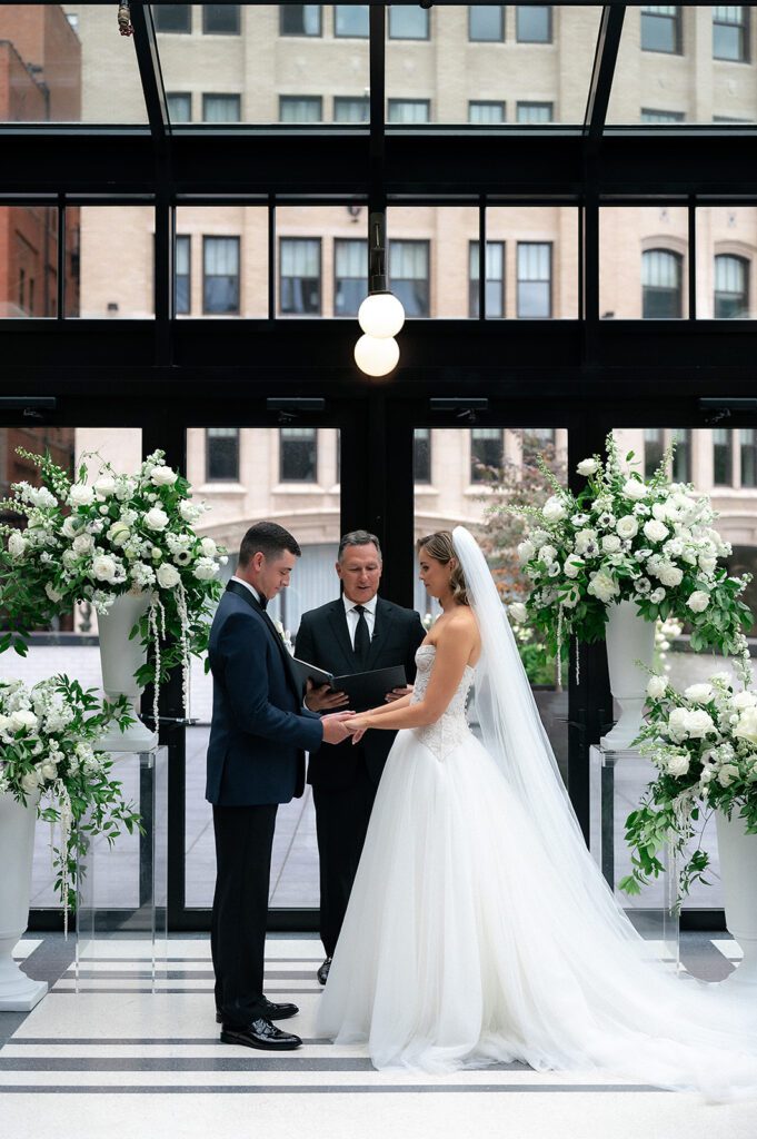 Classic indoor Shinola Hotel wedding ceremony in The Birdy Room