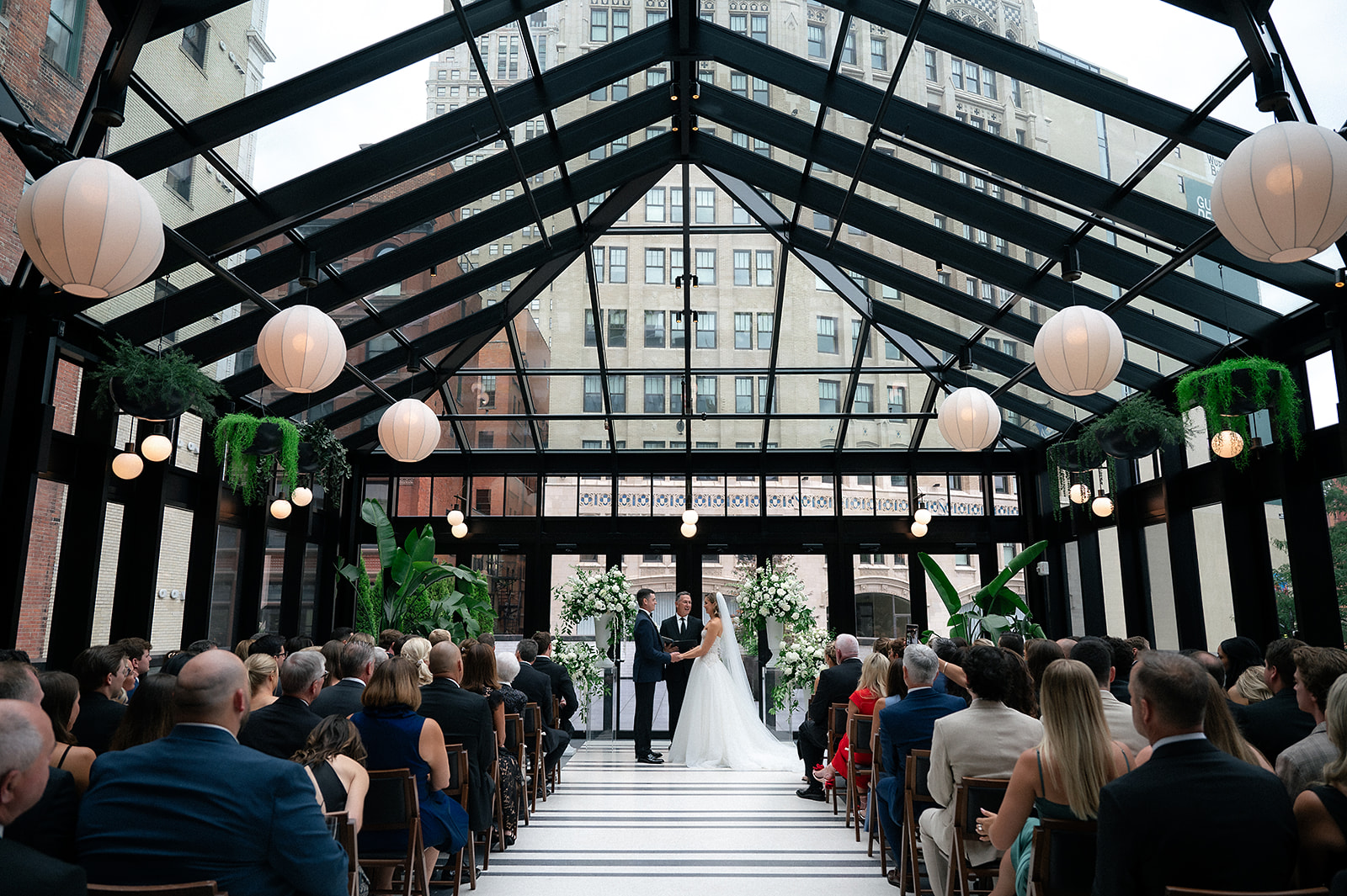 Classic indoor Shinola Hotel wedding ceremony in The Birdy Room