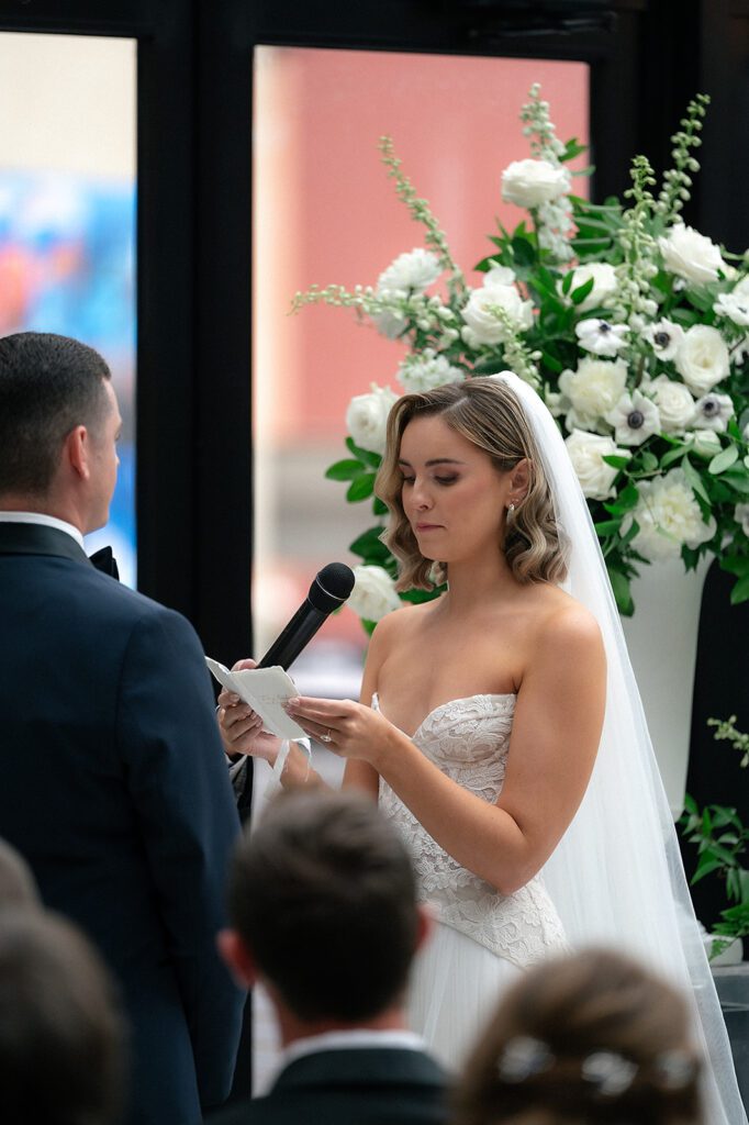 Bride reading vows during the ceremony