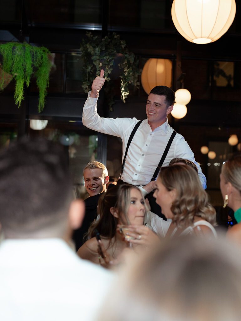 Groom having fun during the reception