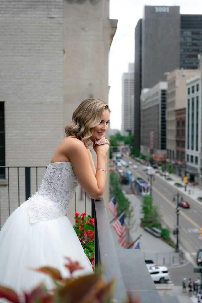 Balcony bridal portraits from a Shinola Hotel wedding in Detroit. Michigan
