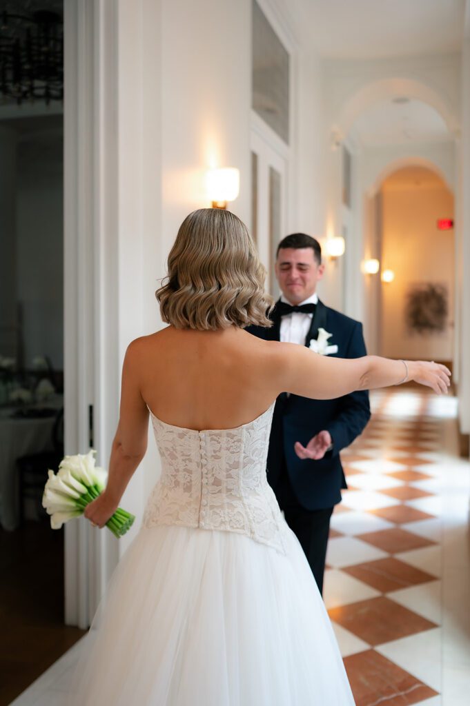 Bride and grooms first look from their Shinola Hotel wedding in Detroit, Michigan