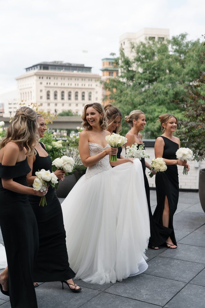 Rooftop bride and bridesmaids portraits from a Shinola Hotel wedding in Detroit, Michigan