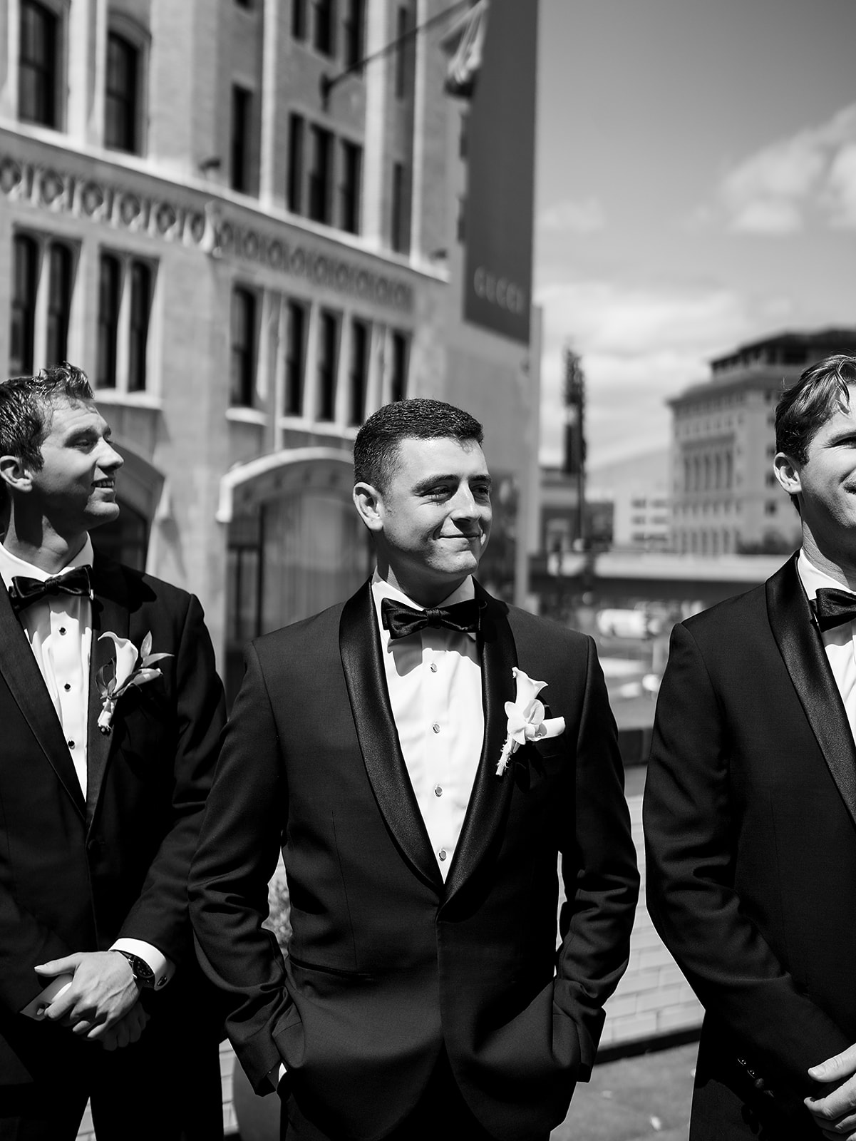 Outdoor groom and groomsmen portraits from a classic Shinola Hotel wedding in Detroit, Michigan