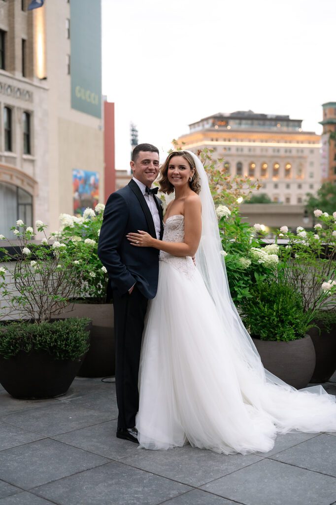 Rooftop bride and groom portraits from a Shinola Hotel wedding in Detroit. Michigan