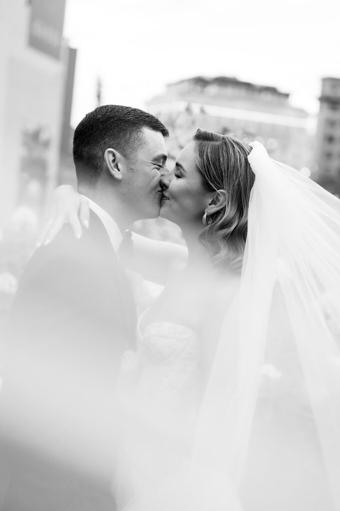 Rooftop bride and groom portraits from a Shinola Hotel wedding in Detroit. Michigan