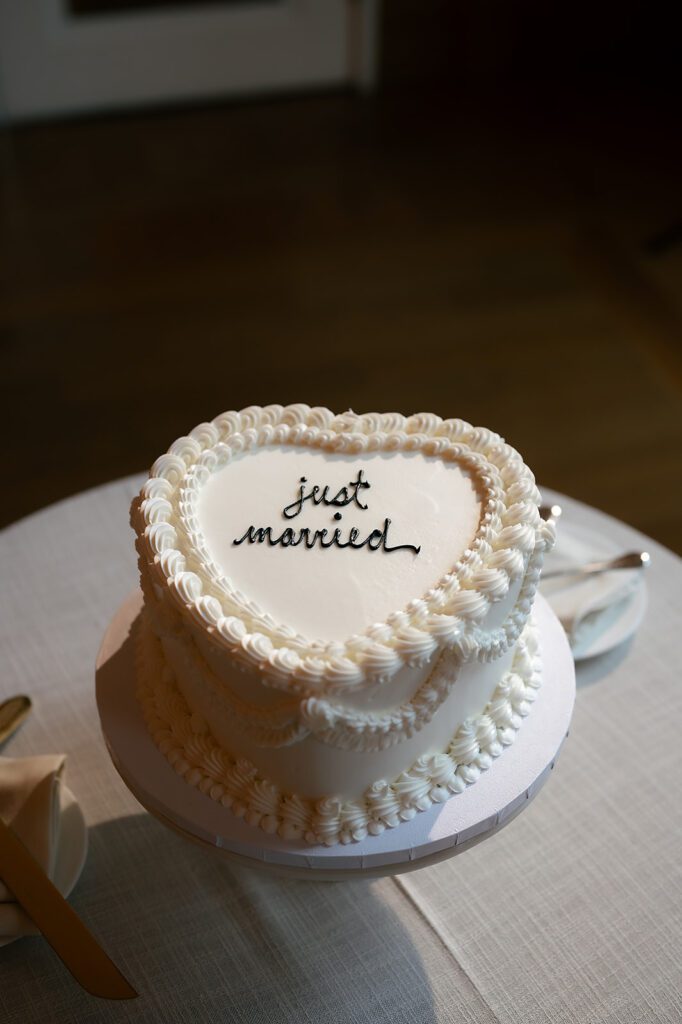 Just Married white heart wedding cake