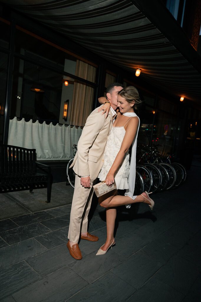 Downtown Deteoit flash bride and groom portraits from their welcome wedding party at Shinola Hotel
