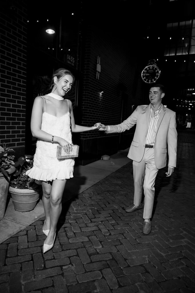 Downtown Deteoit flash bride and groom portraits from their welcome wedding party at Shinola Hotel