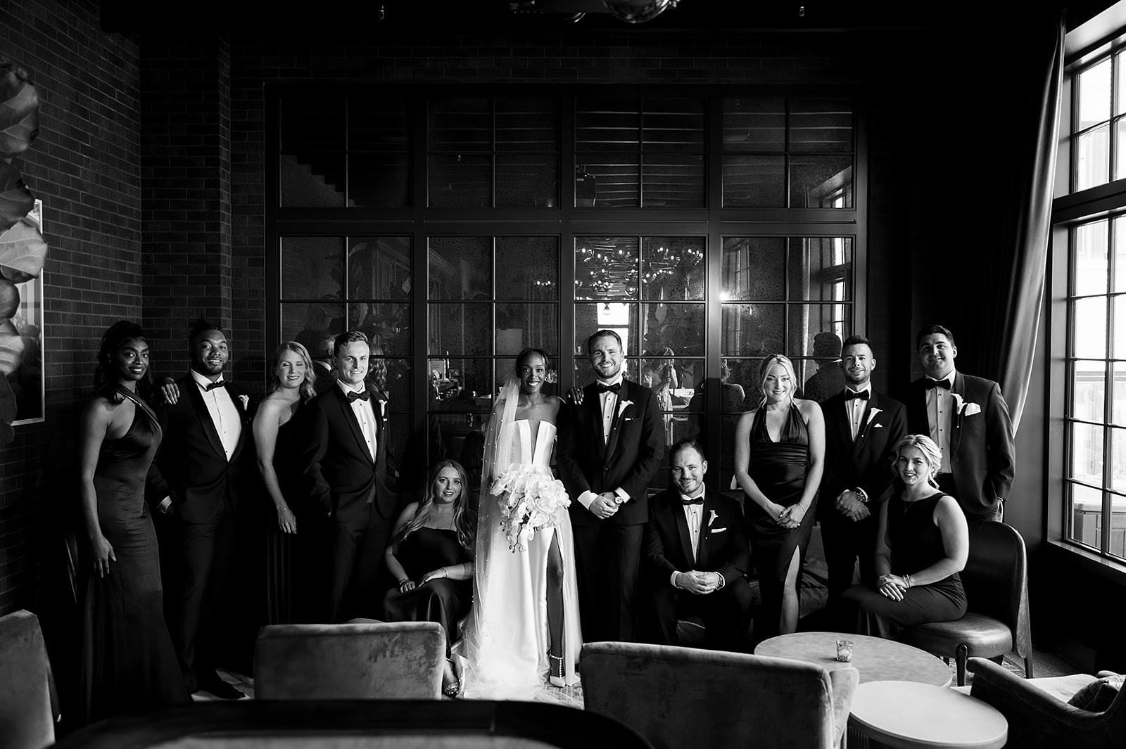 Black and white Book Tower wedding party photo in The Linden Room