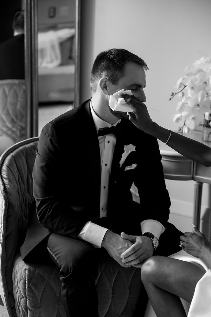 Groom getting emotional during their intimate first look