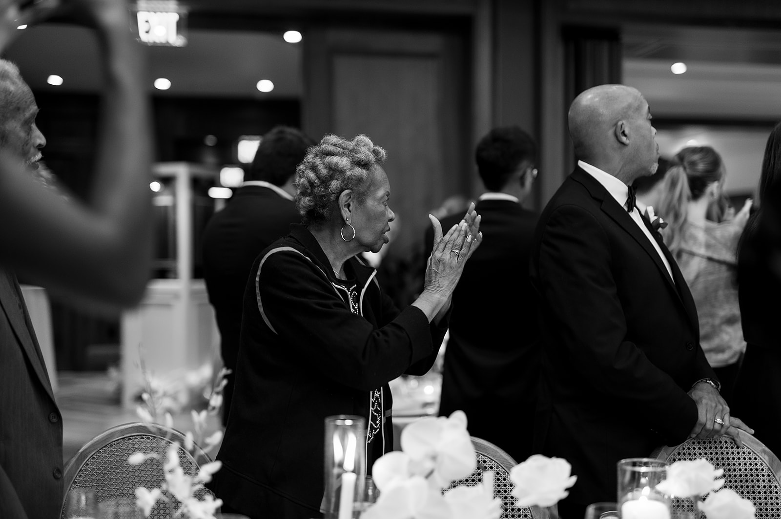Guests welcoming the bride and groom during their grand entrance