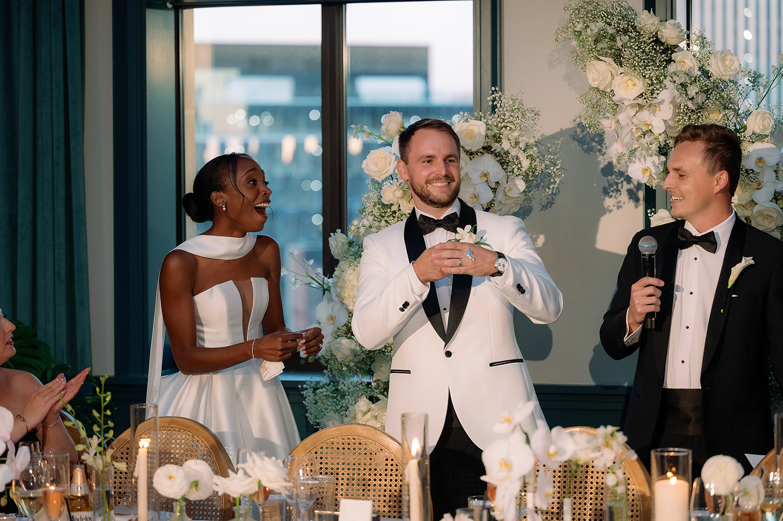 Bride and groom giving speeches