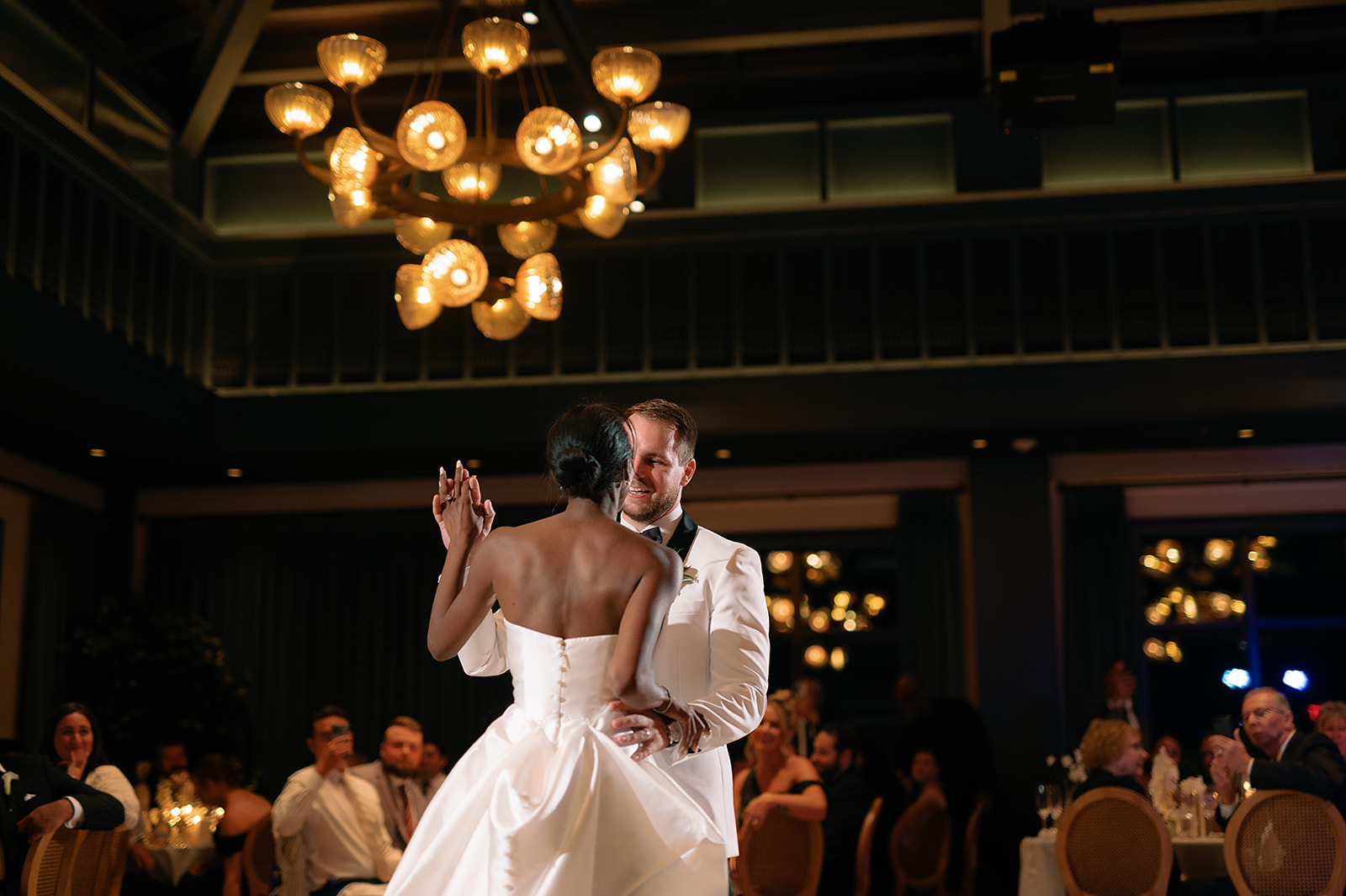 Bride and grooms first dance during their Book Tower wedding reception in The Conservatory