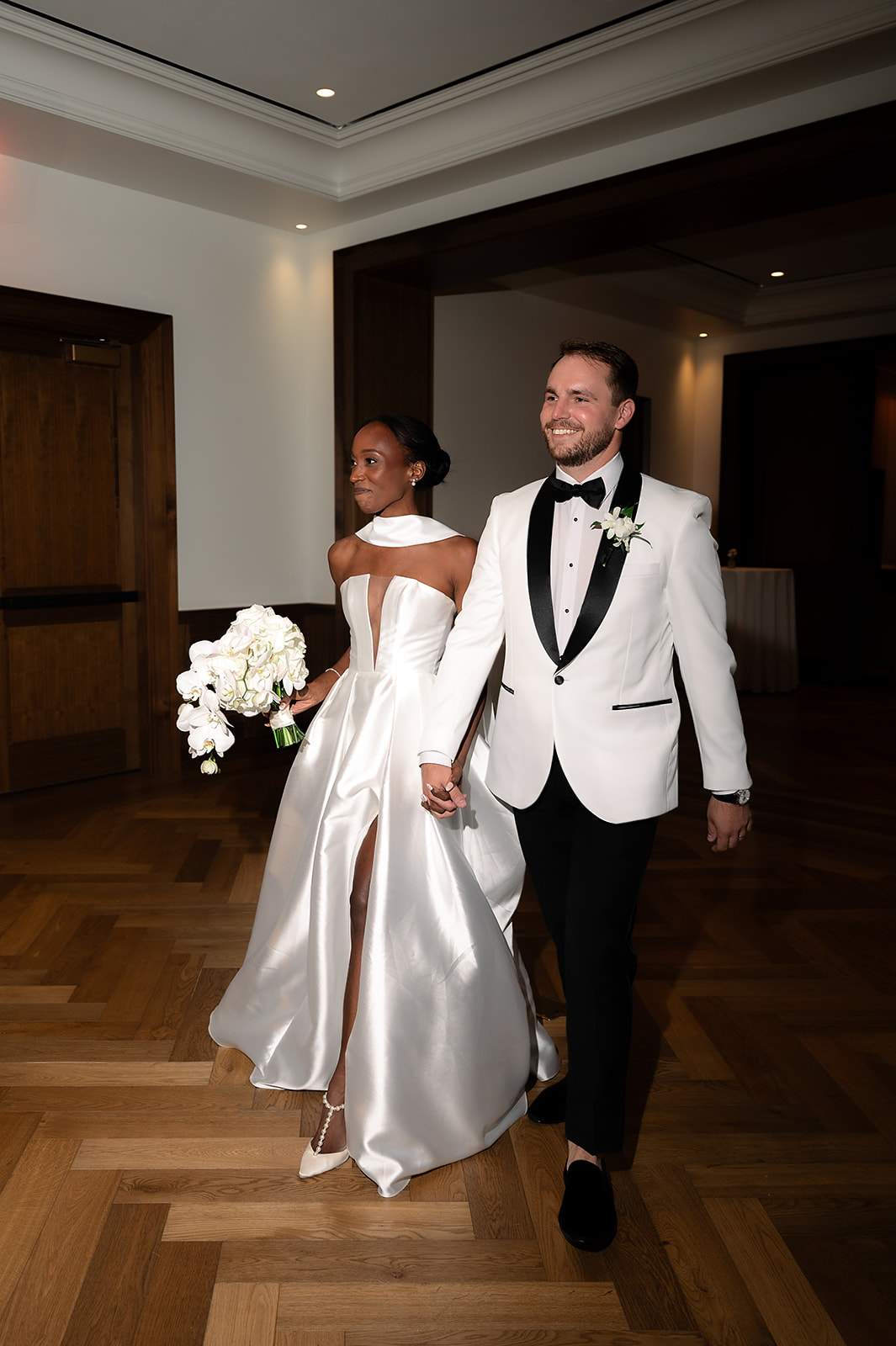Bride and grooms wedding reception entrance 