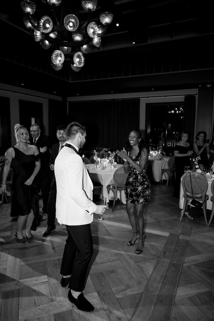 Bride and groom dancing during their Book Tower wedding reception 