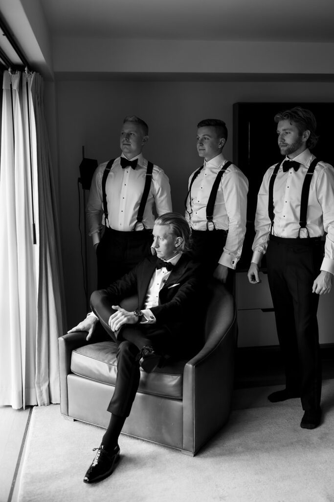 Indoor groom and groomsmen portraits at Shinola Hotel