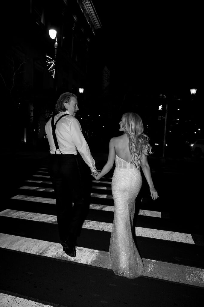Bride and groom walking in downtown Detroit