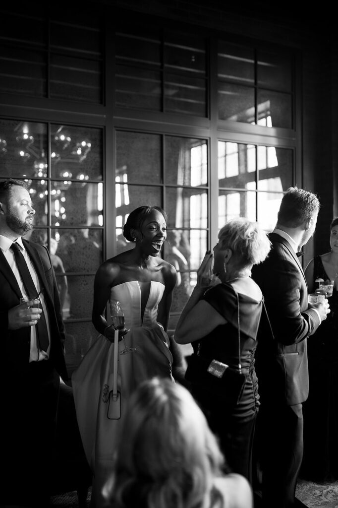 Bride mingling with guests during her cocktail hour