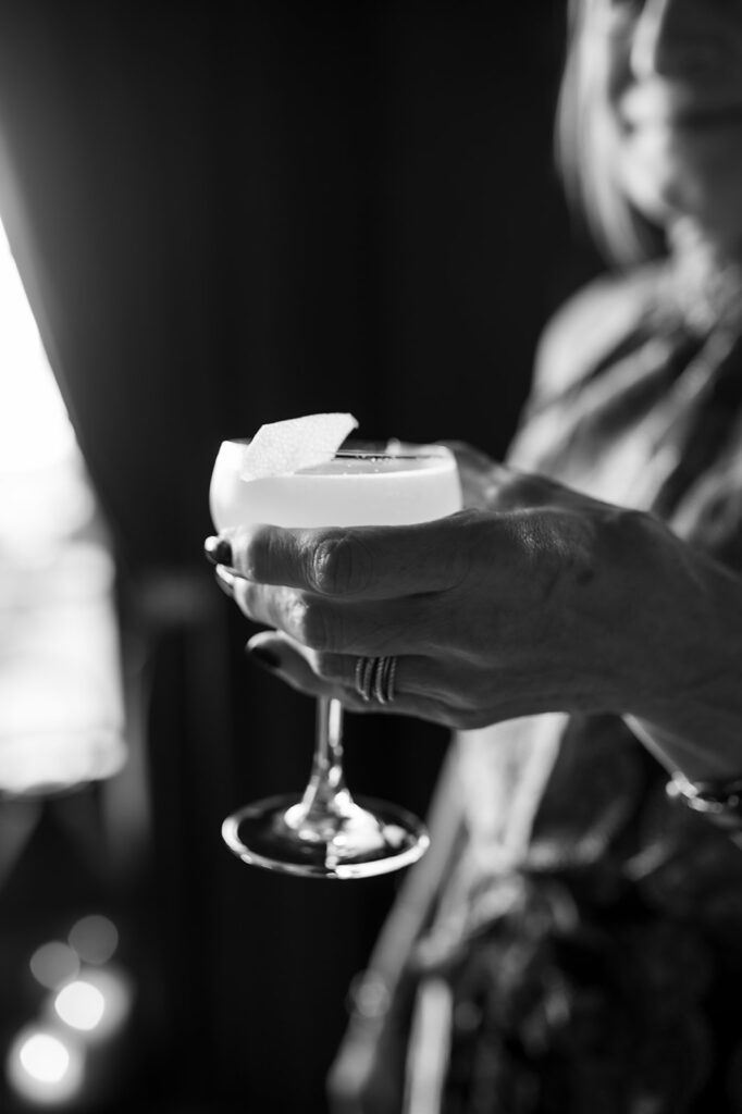 Guest holding a cocktail