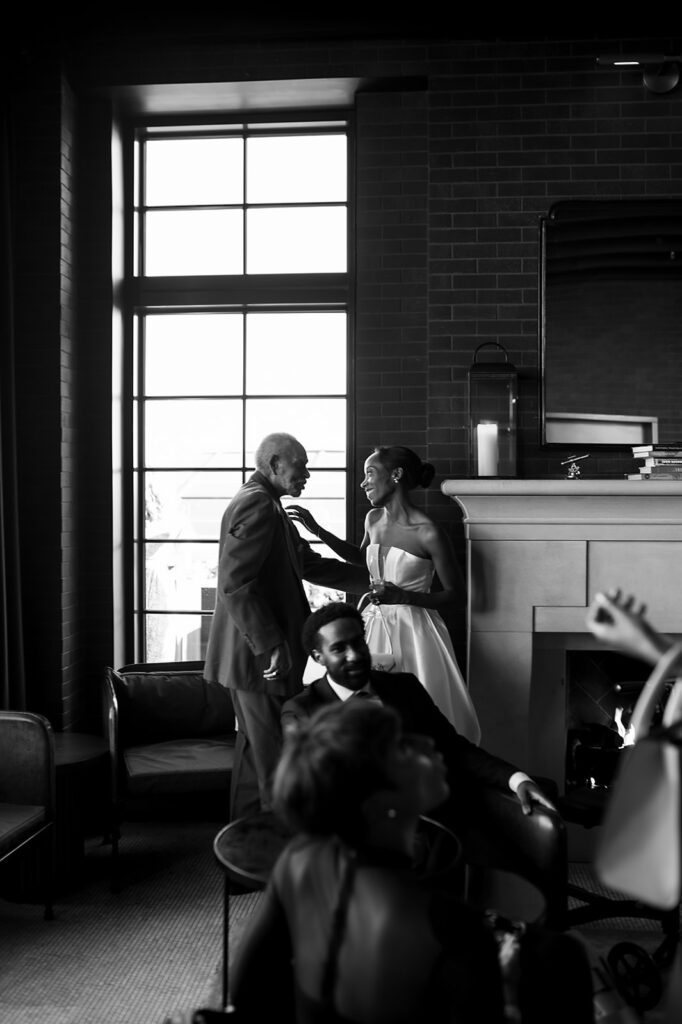 Bride mingling with guests during cocktail hour