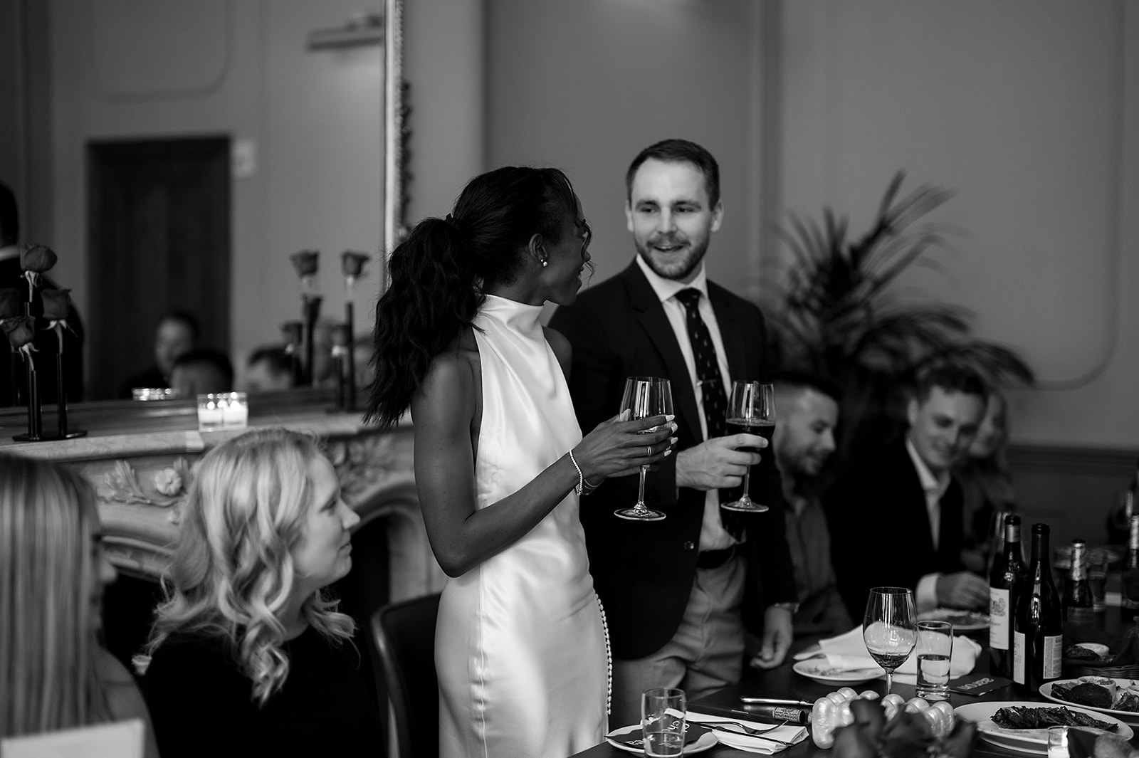 Bride and groom giving a speech during their intimate rehearsal dinner at Le Suprême in Detroit, Michigan
