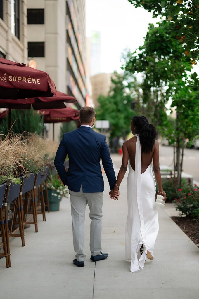 Outdoor bride and grooms portraits from their rehearsal dinner at Le Suprême