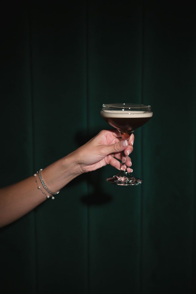 Bride holding an espresso martini