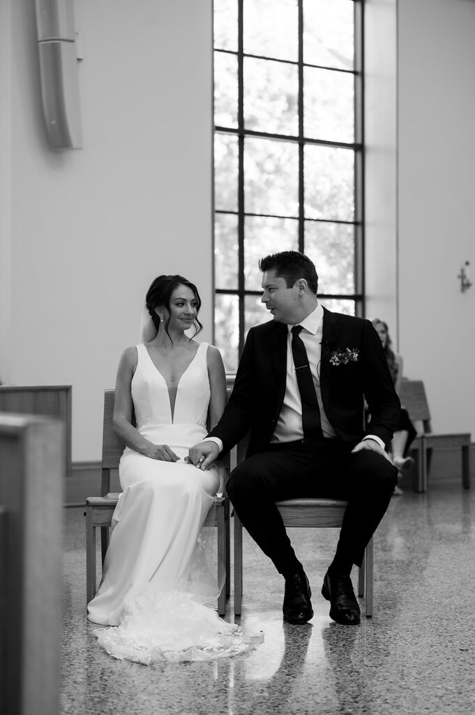 Bride and grooms Grand Rapids Wedding Ceremony at Our Lady Seat of Wisdom Chapel on Aquinis College