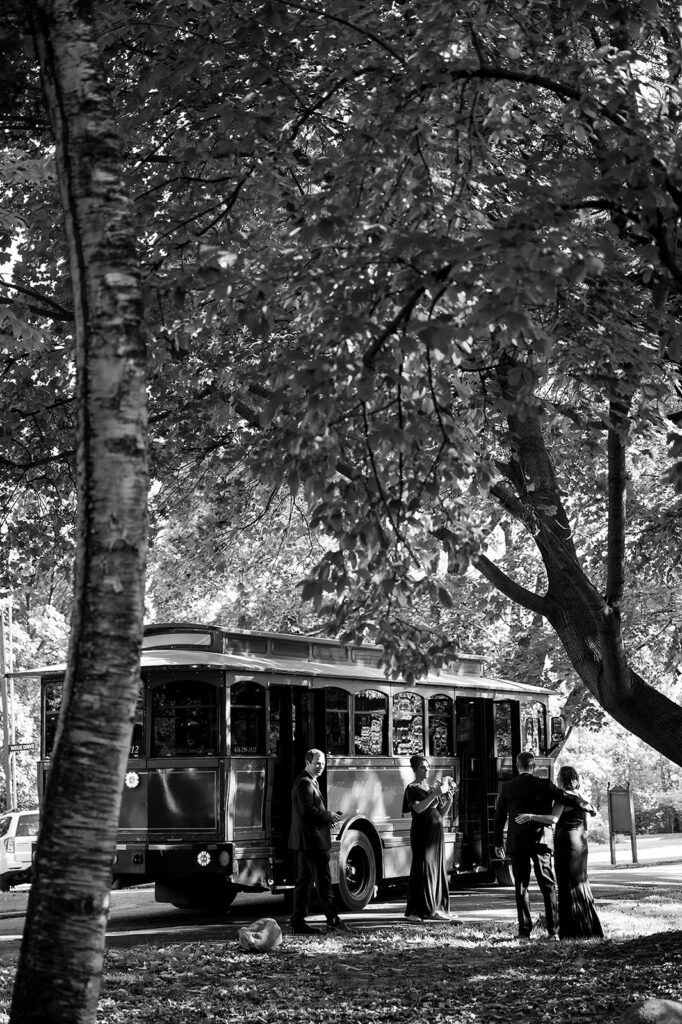 Wedding party loading onto a trolley