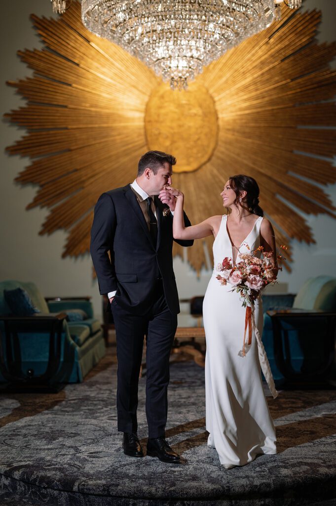 Indoor bride and grooms portraits from their Amway Grand Plaza wedding in Grand Rapids, Michigan