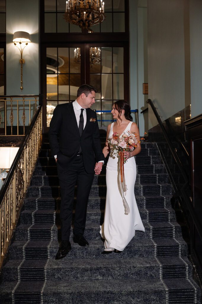 Indoor bride and grooms portraits from their Amway Grand Plaza wedding in Grand Rapids, Michigan