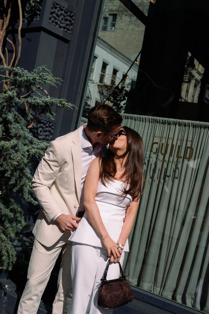 Couple kissing during their SoHo NYC engagement photos