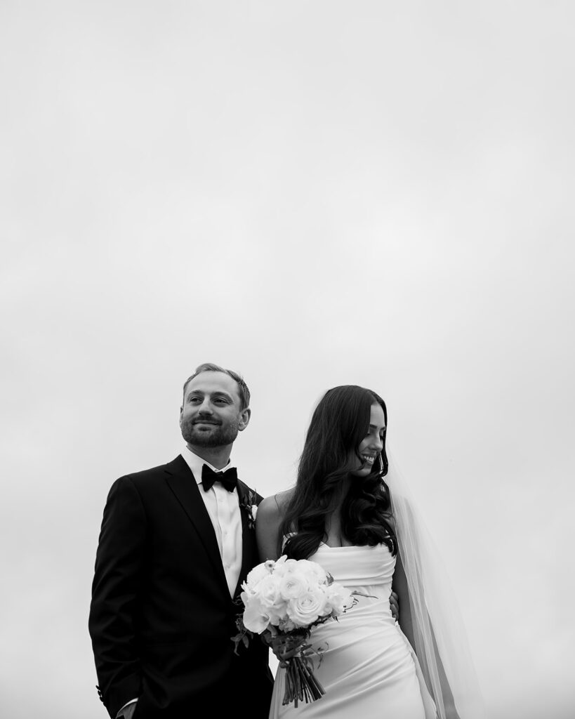 Editorial Northern Michigan wedding portrait of a bride and groom posing together