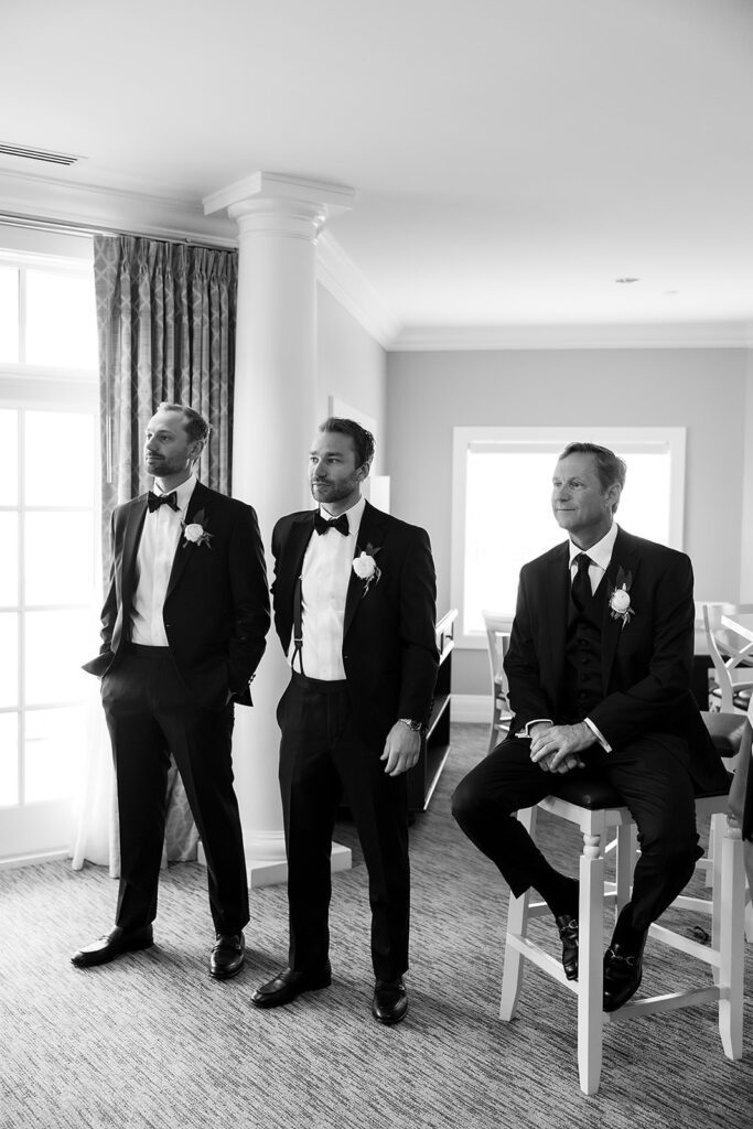 Black and white photo of the groom and his groomsmen