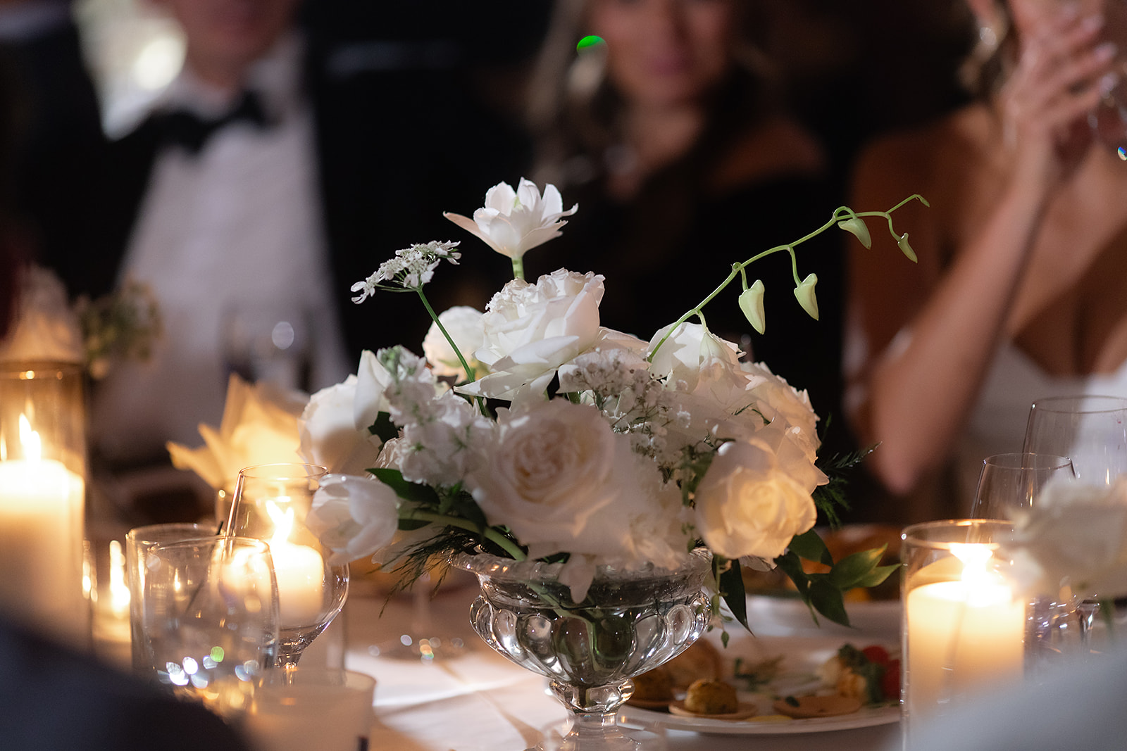 Romantic candlelit tables during the reception