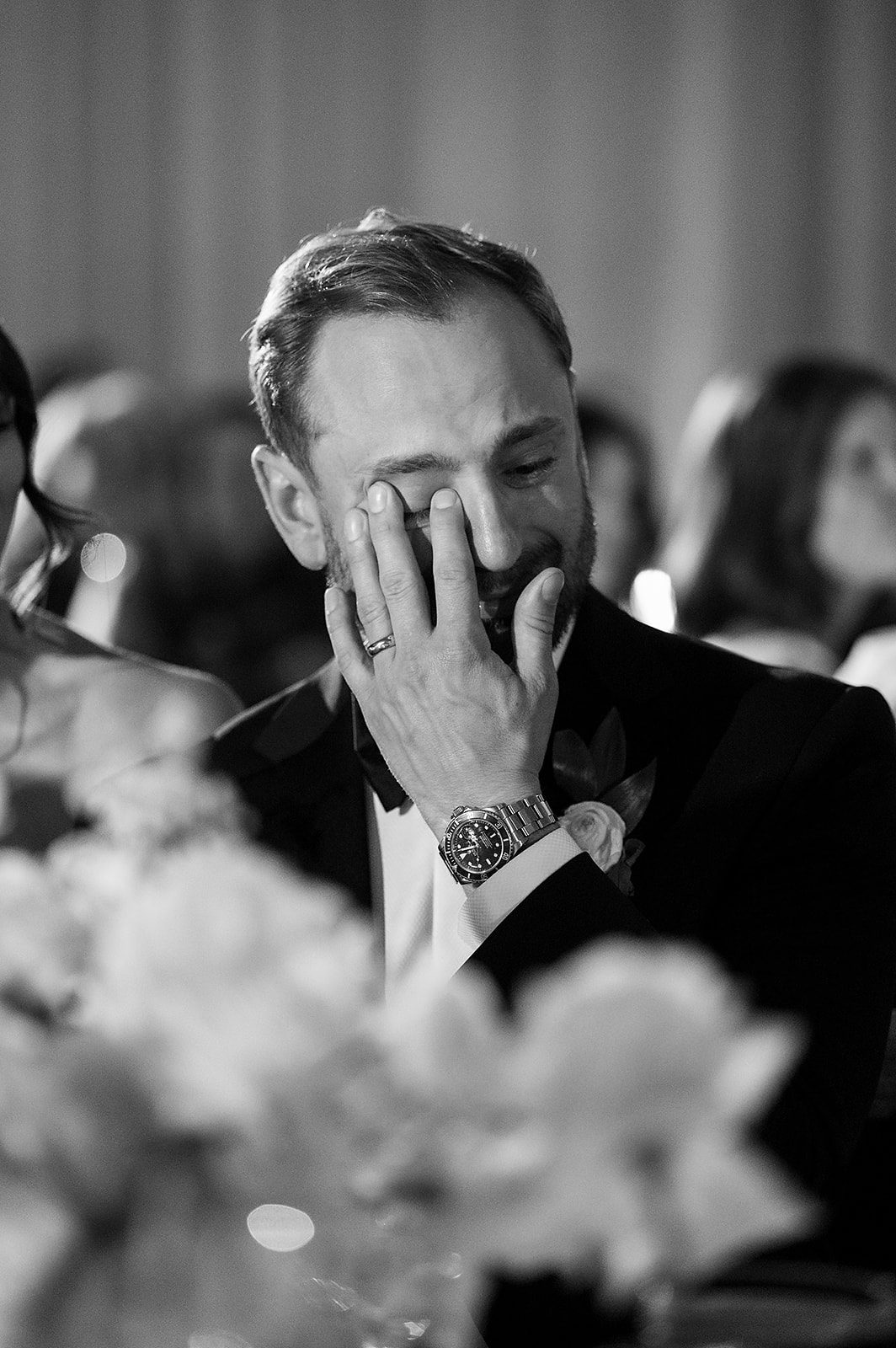 Groom getting emotional during speeches at his Bay Harbor Yacht Club wedding reception in Northern Michigan