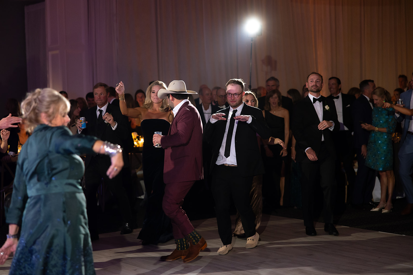 Guests entering the dance floor after the mother son dance