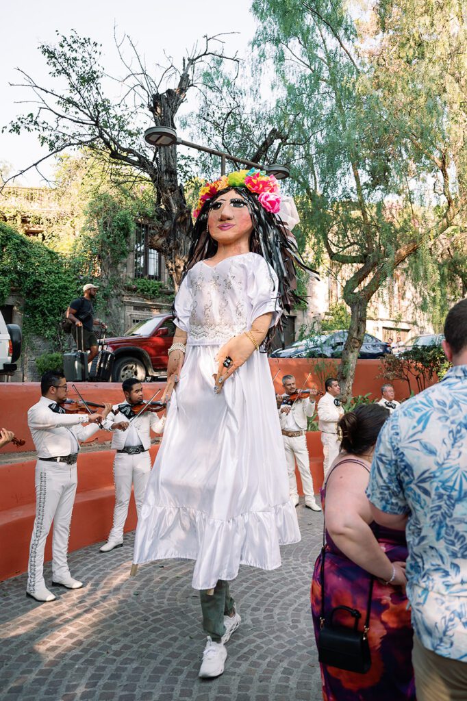 Traditional giant puppet, known as mojigangas during the callejoneada parade in San Miguel de Allende.