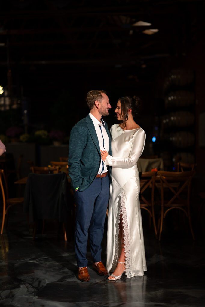 Couple posing for photos during their welcome wedding party