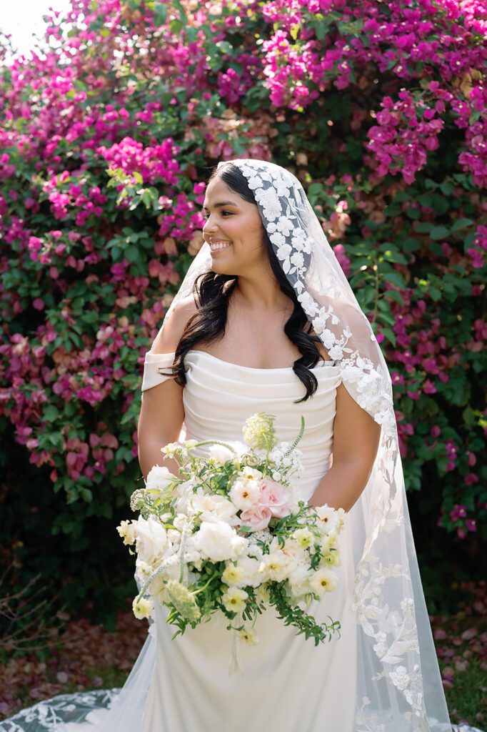 Bride portrait with floral bouquet and lace veil at Hacienda San Luis Gonzaga garden