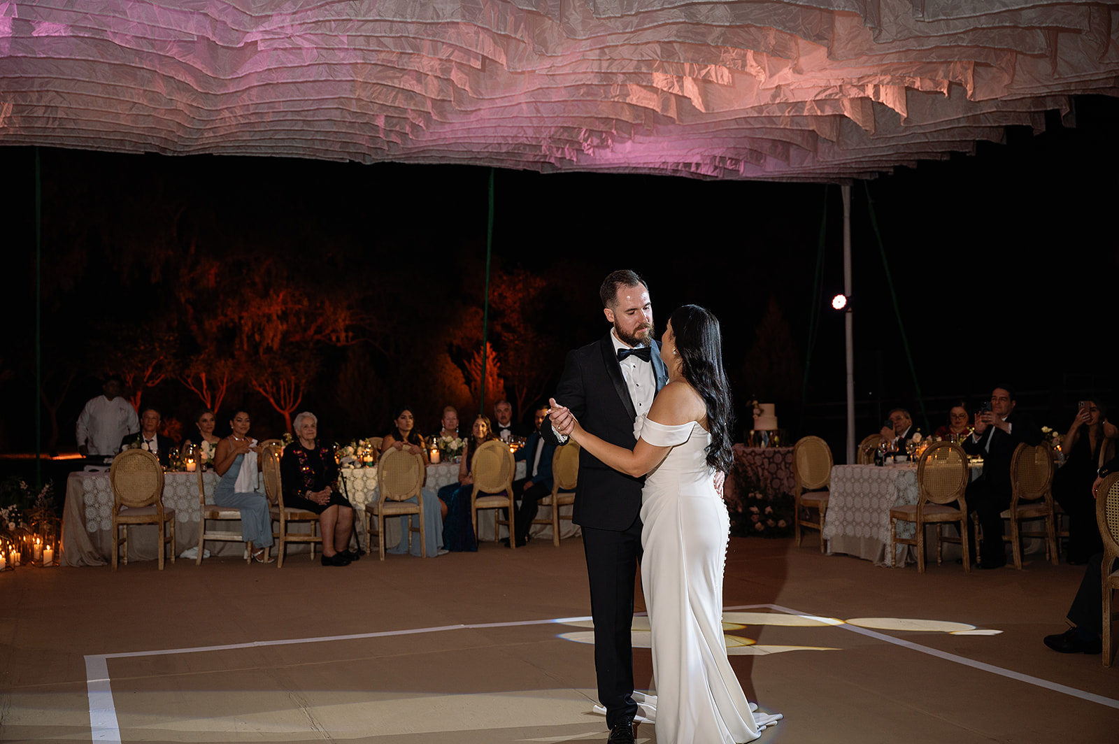 Bride and groom sharing their first dance during their San Miguel de Allende wedding reception at Hacienda San Luis Gonzaga