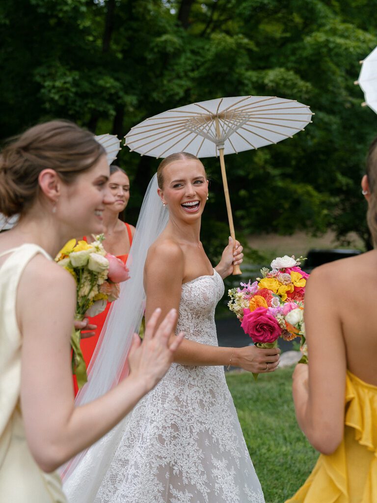Outdoor bride and bridesmaids portraits at Noverr Farms in Traverse City, Michigan.