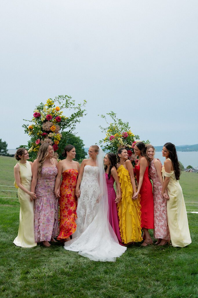 Outdoor bride and bridesmaids portraits at Noverr Farms in Traverse City, Michigan.
