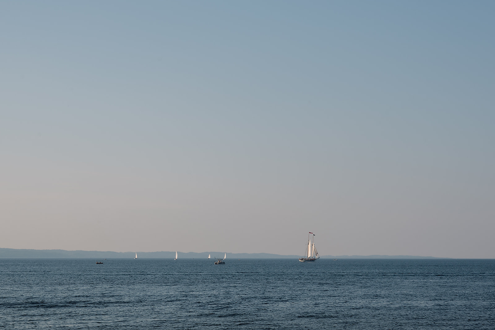 Waterfront view of Grand Traverse Bay during a Delamar wedding welcome party in Traverse City.