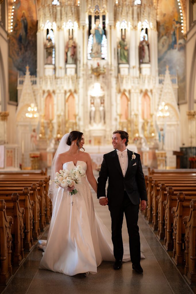 Bride and grooms portraits inside Sweetest Heart of Mary Church in Detroit.