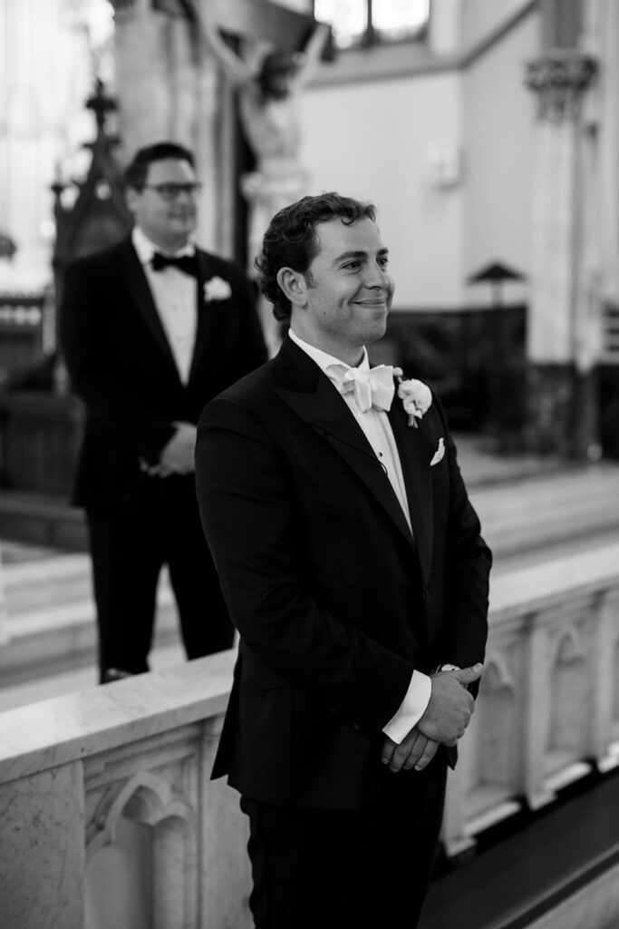 Groom waiting at the altar inside Sweetest Heart of Mary Church in Detroit.