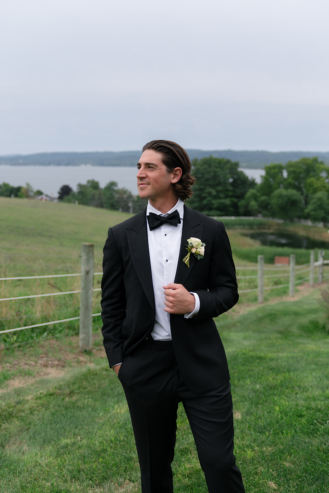 Outdoor grooms portrait at Noverr Farms in Traverse City, Michigan.