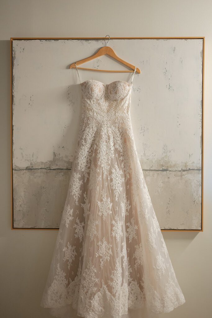 Brides wedding dress hanging