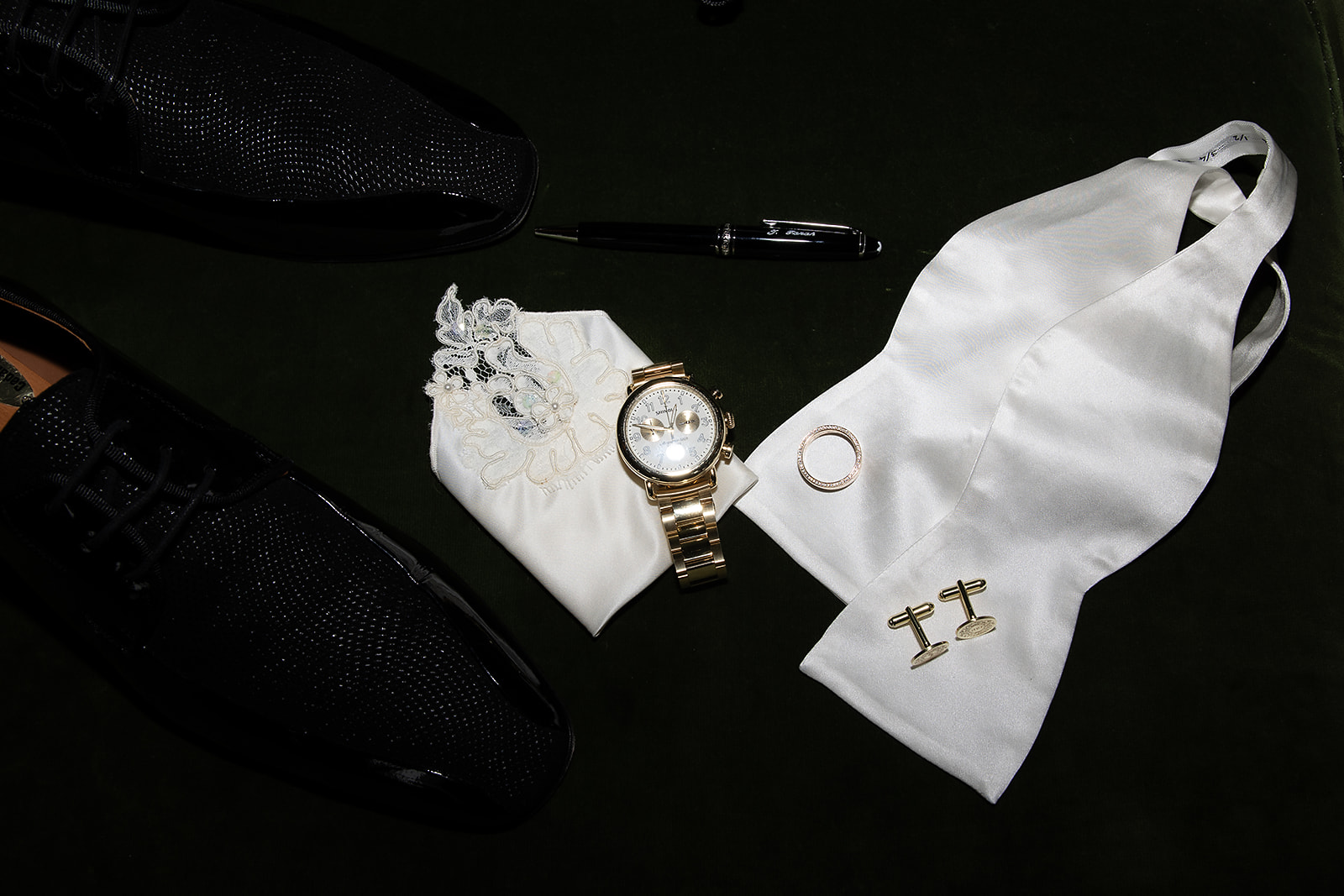 Groom’s shoes, cufflinks, watch, and ring styled together during getting ready at the Shinola Hotel in Detroit.